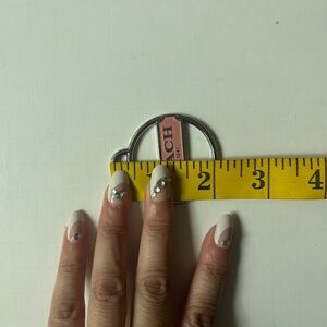 COACH METAL BAG CHARM